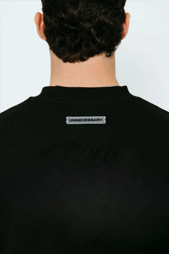 UNNECESSARY Logo Tee Black